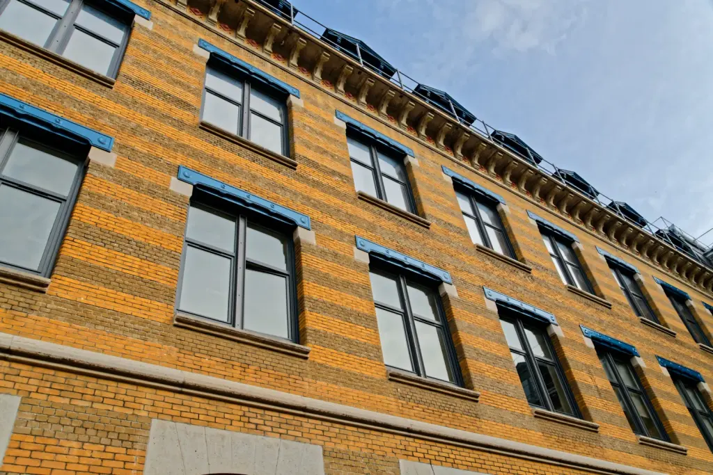 Façade de la Manufacture des Tabacs à Lyon en mars 2019. Archive du lieu de départ annoncé, ne représente pas la manifestation du 31 octobre 2026.