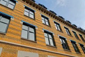 Façade de la Manufacture des Tabacs à Lyon en mars 2019. Archive du lieu de départ annoncé, ne représente pas la manifestation du 31 octobre 2026.