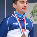 Paul Seixas, en maillot tricolore et médaille, après une course de cyclo-cross en 2024