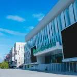 Façade de la Plenitude Arena à Nanterre en juillet 2026, archive