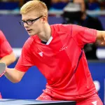 Félix Lebrun en compétition de tennis de table en 2022, archive